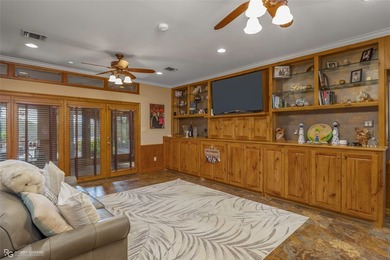 Welcome Home to this extraordinary lakefront retreat situated on - photo 16