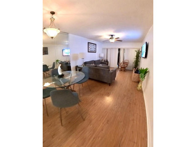 Welcome to sunny Boynton Beach! This move-in-ready 2-bed/2-bath - photo 1