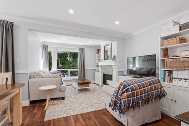 Beautifully renovated end-unit townhome in the highly - photo 1