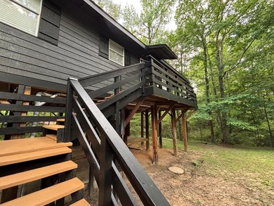 Private East Texas retreat nestled among the trees on 1.24 - photo 13