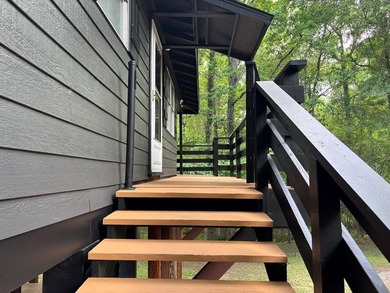 Private East Texas retreat nestled among the trees on 1.24 - photo 14