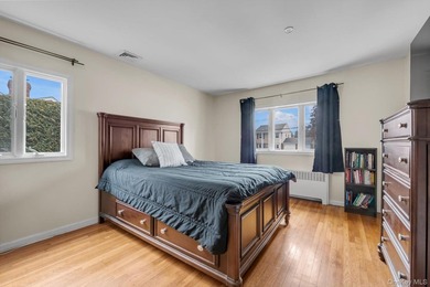 Nestled on a quiet, tree-lined street in a highly desirable - photo 12