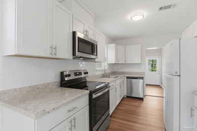 Move-in ready, beautifully renovated, and affordably priced - photo 12