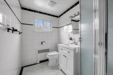 Nestled on a quiet, tree-lined street in a highly desirable - photo 13