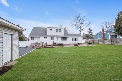 Nestled on a quiet, tree-lined street in a highly desirable - photo 16