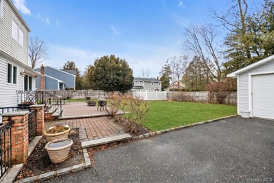 Nestled on a quiet, tree-lined street in a highly desirable - photo 17