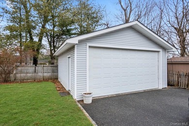 Nestled on a quiet, tree-lined street in a highly desirable - photo 19
