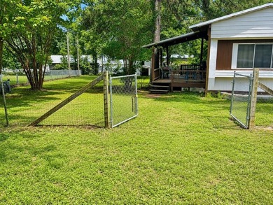 Just minutes from the shores of Lake Eufaula, this charming lake - photo 3