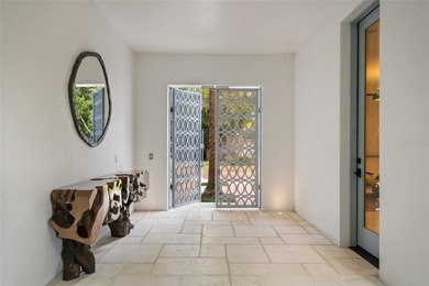 Conveniently situated near the Winter Park Country Club, this - photo 3