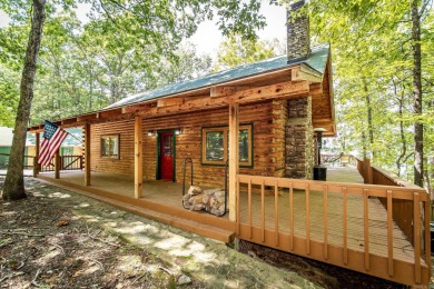 Escape to tranquility with this stunning Lakefront Log Cabin - Lake Home For Sale in Quitman, Arkansas