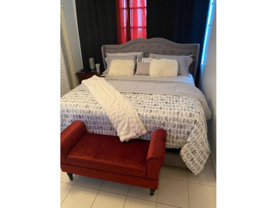 This spacious 2-bedroom, 2-bathroom unit features an open living - photo 8