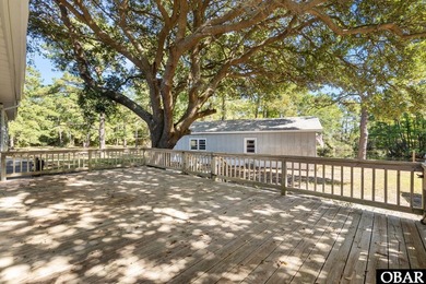 Discover the potential of 1513 Colington Road, a charming - photo 3