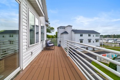 This condominium is the ideal water town retreat for an easy - photo 3