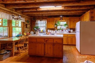 Welcome to your dream home-a stunning log cabin blending classic - photo 14