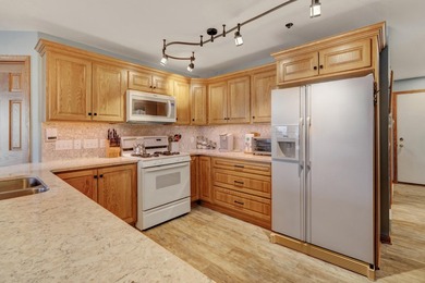 This condominium is the ideal water town retreat for an easy - photo 8