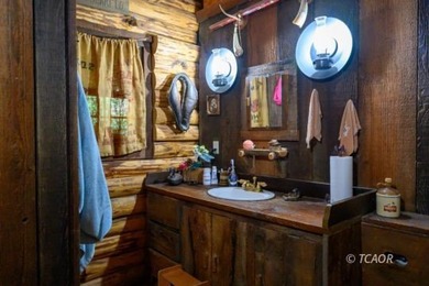 Welcome to your dream home-a stunning log cabin blending classic - photo 21