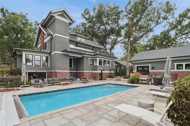 Blending timeless charm with modern luxury, this meticulously