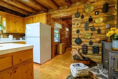 Welcome to your dream home-a stunning log cabin blending classic - photo 37