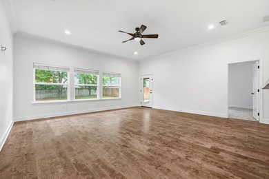 Beautifully maintained 4-bedroom, 3-bath brick home tucked away - photo 11