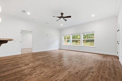 Beautifully maintained 4-bedroom, 3-bath brick home tucked away - photo 12