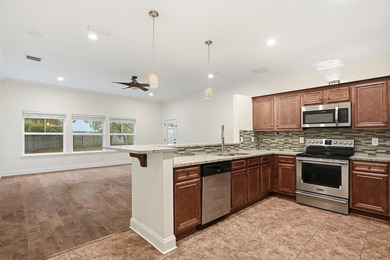 Beautifully maintained 4-bedroom, 3-bath brick home tucked away - photo 15