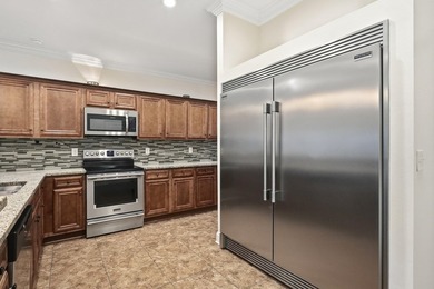 Beautifully maintained 4-bedroom, 3-bath brick home tucked away - photo 16