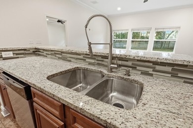 Beautifully maintained 4-bedroom, 3-bath brick home tucked away - photo 19