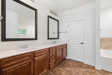 Beautifully maintained 4-bedroom, 3-bath brick home tucked away - photo 26