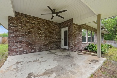 Beautifully maintained 4-bedroom, 3-bath brick home tucked away - photo 44