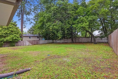 Beautifully maintained 4-bedroom, 3-bath brick home tucked away - photo 46