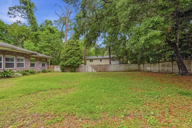 Beautifully maintained 4-bedroom, 3-bath brick home tucked away - photo 47