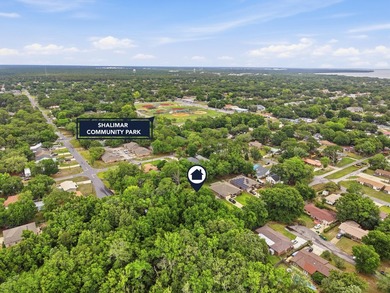 Beautifully maintained 4-bedroom, 3-bath brick home tucked away - photo 49