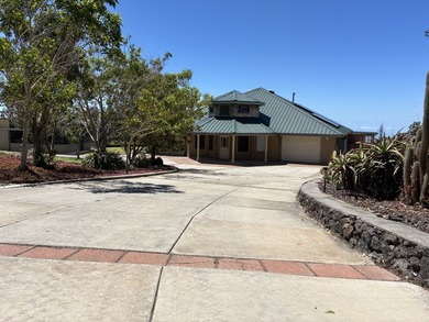 Perched atop a private hilltop with Pacific Ocean views, this - photo 1