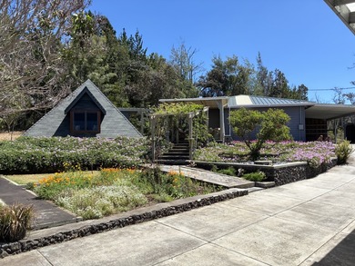 Perched atop a private hilltop with Pacific Ocean views, this - photo 3