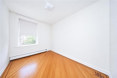 Welcome to this legal two-family solid brick home, conveniently - photo 15