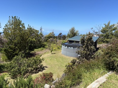 Perched atop a private hilltop with Pacific Ocean views, this - photo 7