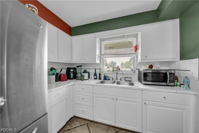 Discover this charming and well-maintained 3-bedroom, 2-bathroom - photo 9