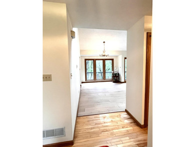 Nestled in a lush, park-like setting, this stunning custom-built - photo 22