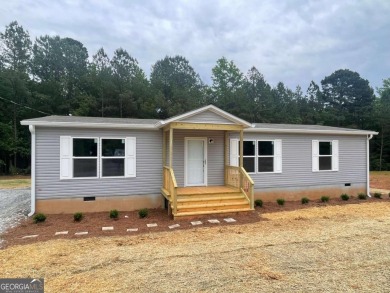 Lake Home For Sale in Eatonton, Georgia
