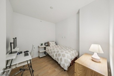 Discover sophisticated city living in this bright and spacious - photo 6