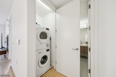 Discover sophisticated city living in this bright and spacious - photo 7