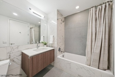 Discover sophisticated city living in this bright and spacious - photo 8