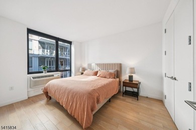 Discover sophisticated city living in this bright and spacious - photo 10