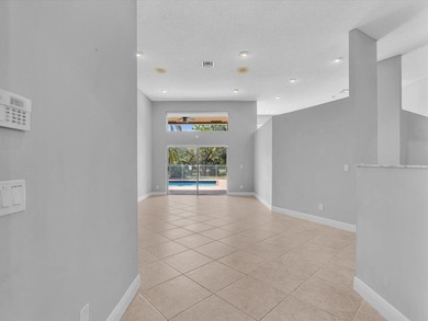 Beautifully updated waterfront pool home in the highly - photo 4