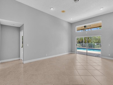 Beautifully updated waterfront pool home in the highly - photo 6