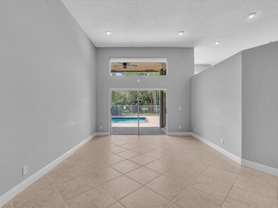 Beautifully updated waterfront pool home in the highly - photo 7