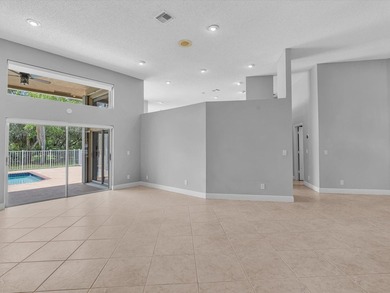 Beautifully updated waterfront pool home in the highly - photo 9