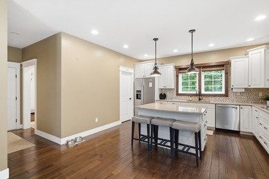 Welcome to this exceptional two-story walkout nestled on a - photo 10