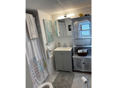 This Spectacular, fully renovated mobile home (2024) set on its - photo 12