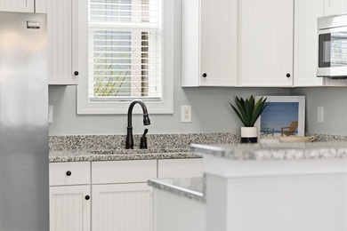 Live the golf and beach lifestyle in this fully furnished - photo 13